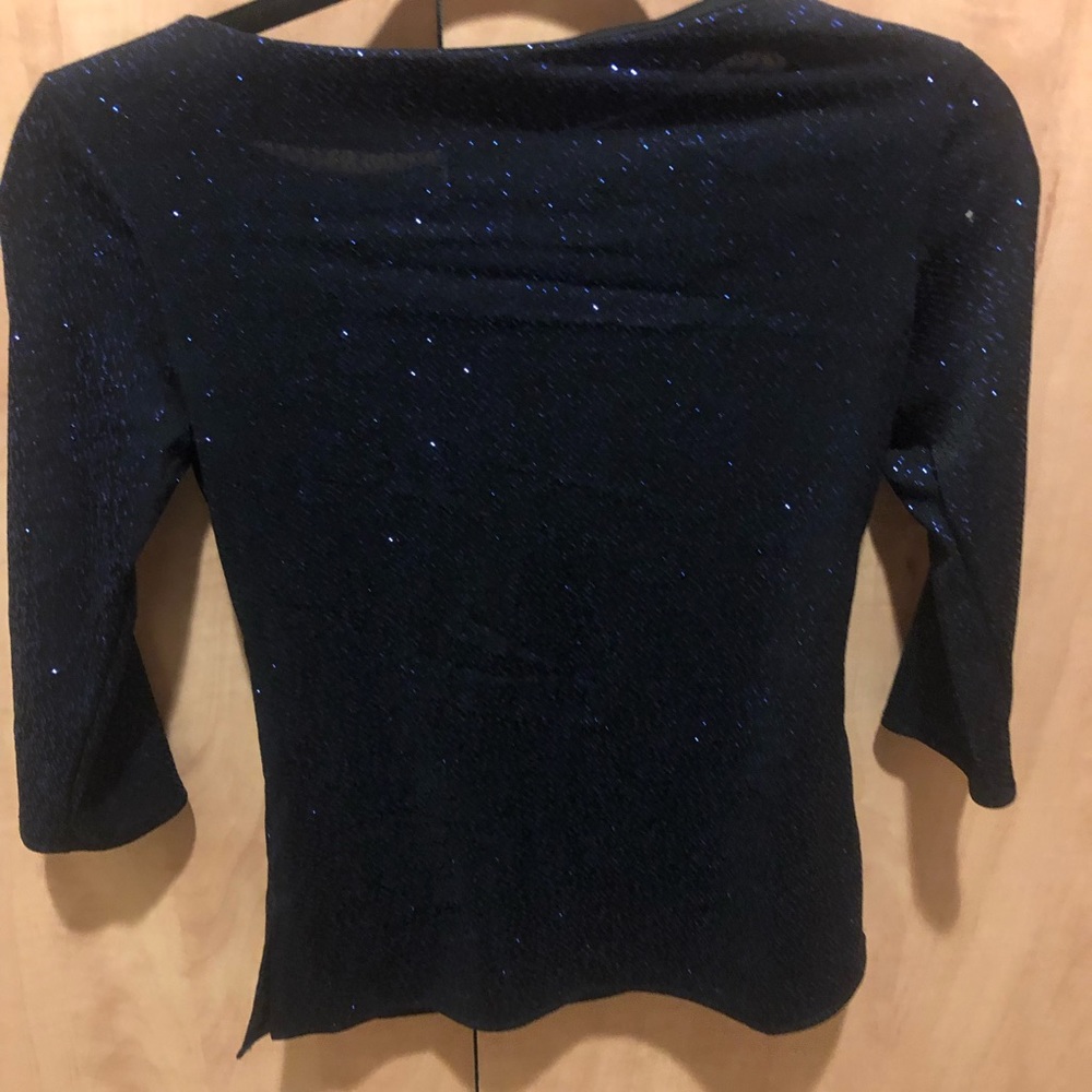 Glittery navy blue top.